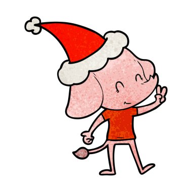 Noel Baba şapkası giyen bir filin sevimli dokulu çizgi