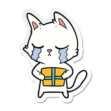 etiket Noel hediyesi tutan ağlayan bir karikatür kedi