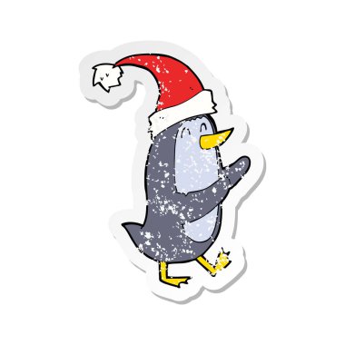 Retro sıkıntılı etiket bir karikatür Noel penguen