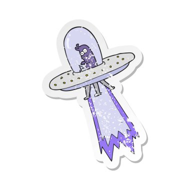 Retro sıkıntılı etiket bir karikatür uçan daire