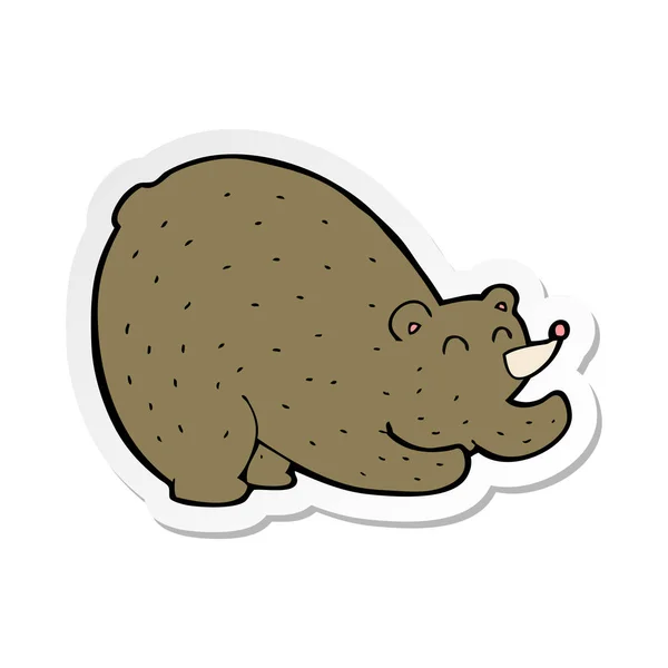 Sticker of a cartoon stretching bear — Stock Vector