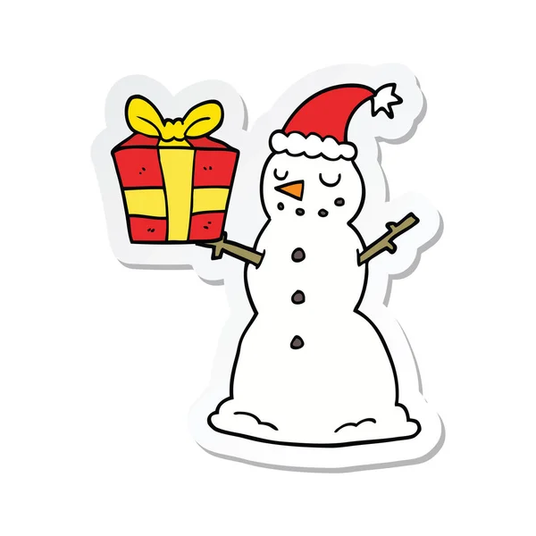 Aufkleber eines Cartoon-Schneemanns mit Geschenk — Stockvektor