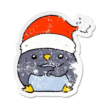 Noel şapka giymiş bir sevimli çizgi penguen sıkıntılı etiket