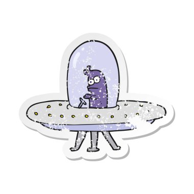 Retro sıkıntılı etiket bir karikatür uçan daire