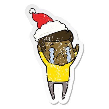 sıkıntılı etiket karikatür giyen Noel Baba şapkası ağlıyor bir adamın el çekilmiş