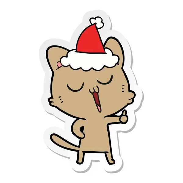 Desenho animado etiqueta de um gato cantando usando chapéu de santa —  Vetores de Stock