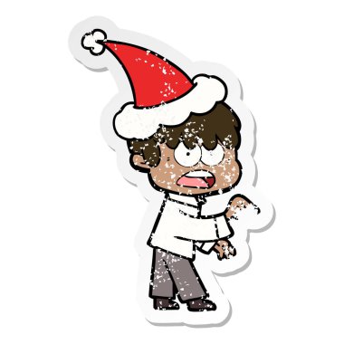 sıkıntılı etiket karikatür Noel Baba şapkası giyen bir çocuğun endişeli