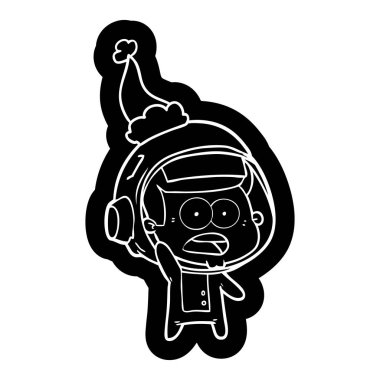 Noel Baba şapkası giyen bir sürpriz astronot çizgi film simgesi