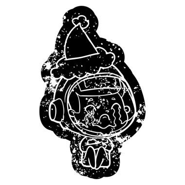 Noel Baba şapkası giyen ağlayan bir astronotun ilginç karikatür sıkıntılı simgesi