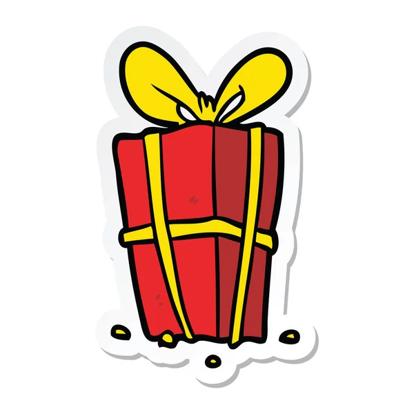Pegatina de un regalo de Navidad de dibujos animados — Vector de stock