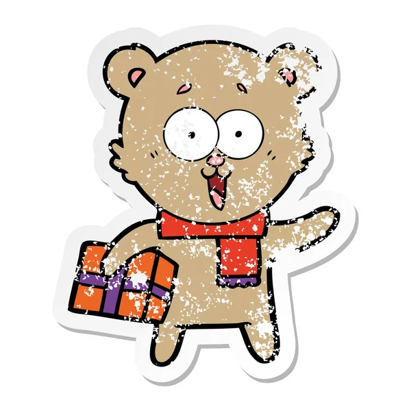 Aufkleber Eines Lachenden Teddybären Mit Weihnachtsgeschenk — Stockvektor