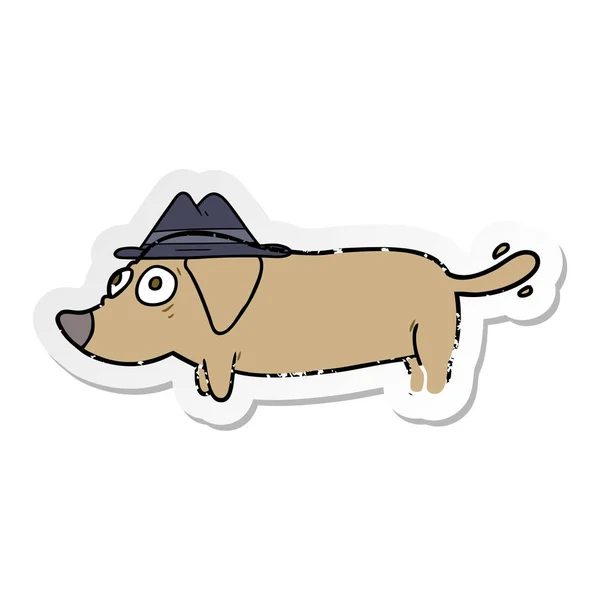 Adesivo angosciato di un cane del fumetto che indossa il cappello — Vettoriale Stock