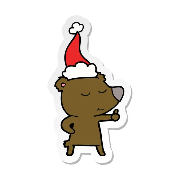 Happy Hand Drawn Sticker Cartoon Bear Giving Thumbs Wearing Santa — Stock Vector