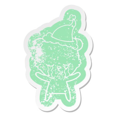 Noel Baba şapkası giyen bir polarbear ilginç karikatür sıkıntılı etiket ağlıyor