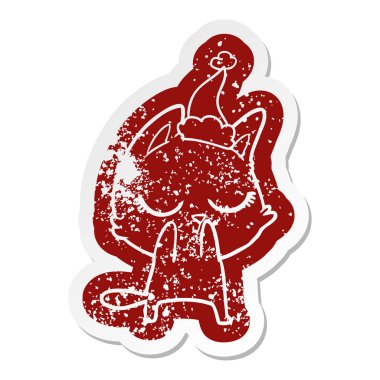 Noel Baba şapkası giyen bir kedi çizgi film sıkıntılı etiket sakin