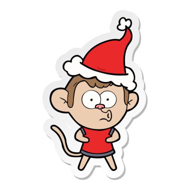 etiket karikatür Noel Baba şapkası giyen bir sürpriz maymun