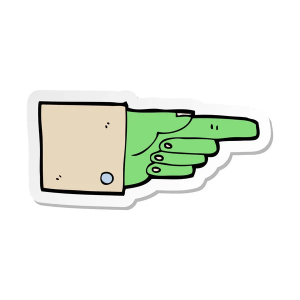 Klistermärke av en tecknad peka zombie hand — Stock vektor