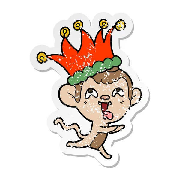 Aufkleber Eines Verrückten Cartoon Affen Mit Narrenhut — Stockvektor