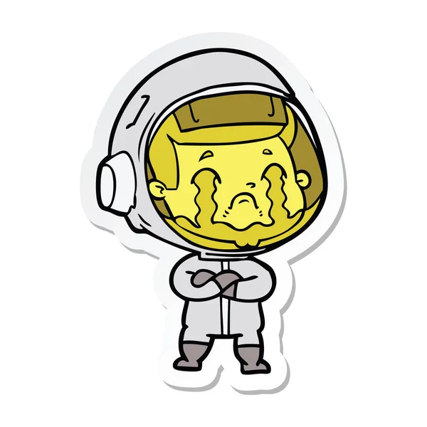 Autocollant d'un astronaute en pleurs de dessin animé — Image vectorielle