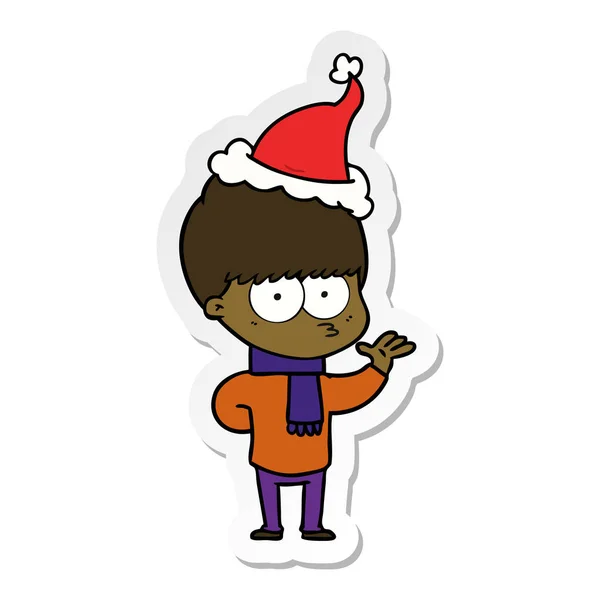 산타 모자를 쓰고 소년의 긴장 스티커 만화 — 스톡 벡터