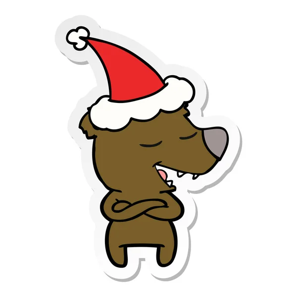 Sticker cartoon of a bear wearing santa hat — Stock Vector