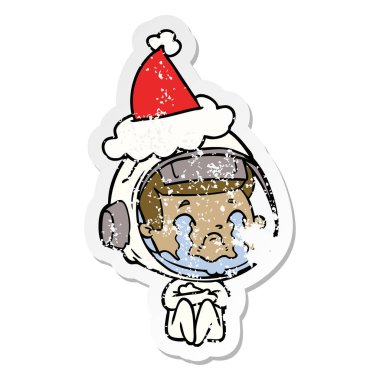 santa s giyen ağlayan bir astronotun sıkıntılı etiket çizgi film