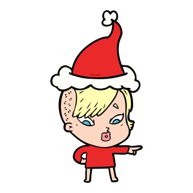 çizgi çizme giyen Noel Baba şapkası işaret sürpriz bir kızın el çekilmiş