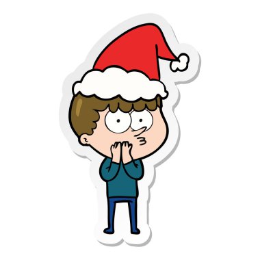 Noel Baba şapkası giyen meraklı bir çocuk etiket karikatür el çekilmiş