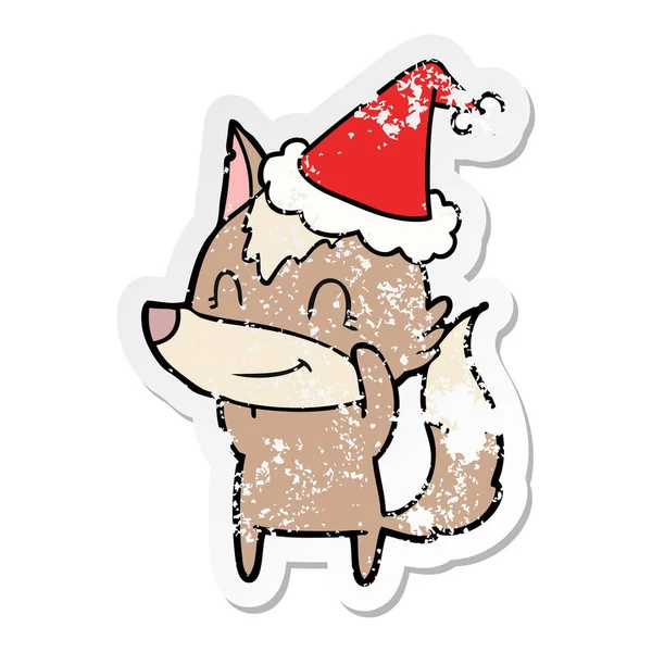 Freundlich bekümmert Aufkleber Karikatur eines Wolfes mit Weihnachtsmütze — Stockvektor