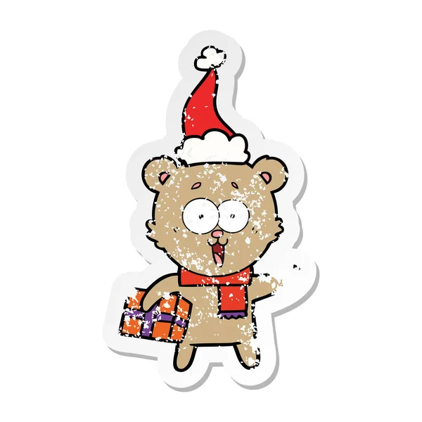 Lachender Teddybär Mit Weihnachtsgeschenk Mit Weihnachtsmütze — Stockvektor