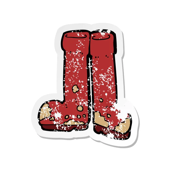 Retro Distressed Sticker Cartoon Muddy Boots — Stock Vector