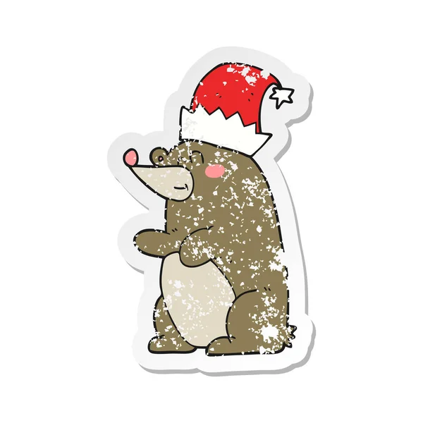 Retro Aufkleber Eines Cartoon Bären Mit Weihnachtsmütze — Stockvektor