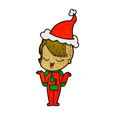 mutlu el bir kızın dokulu çizgi film uzay giysisi giyen Noel Baba şapkası çizilmiş.
