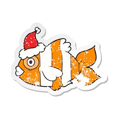 sıkıntılı etiket karikatür Noel Baba şapkası giyen bir egzotik balık