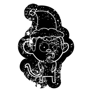 Noel Baba şapkası giyen giderme bir maymunun karikatür sıkıntılı simgesi