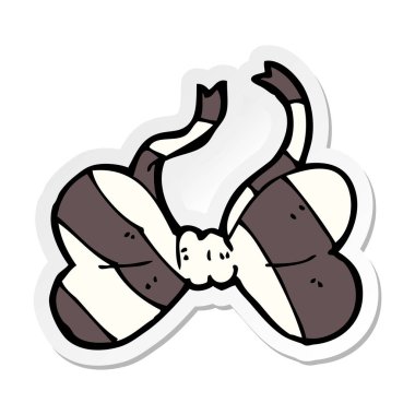 bir çizgi film şeritli papyon etiket