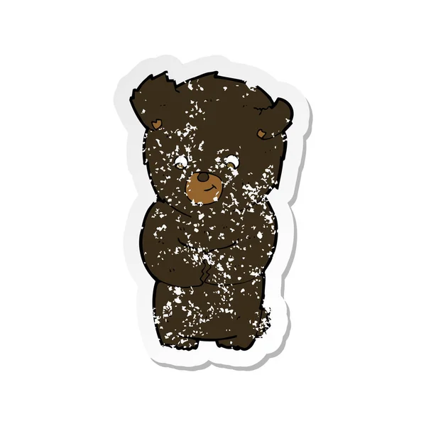 Retro angustiado adesivo de um bonito desenho animado urso preto — Vetor de Stock