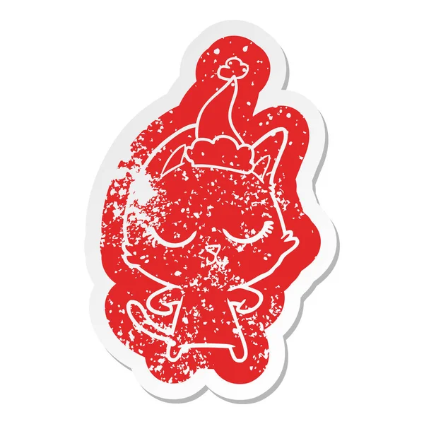 Noel Baba şapkası giyen bir kedinin ilginç karikatür sıkıntılı etiket sakin