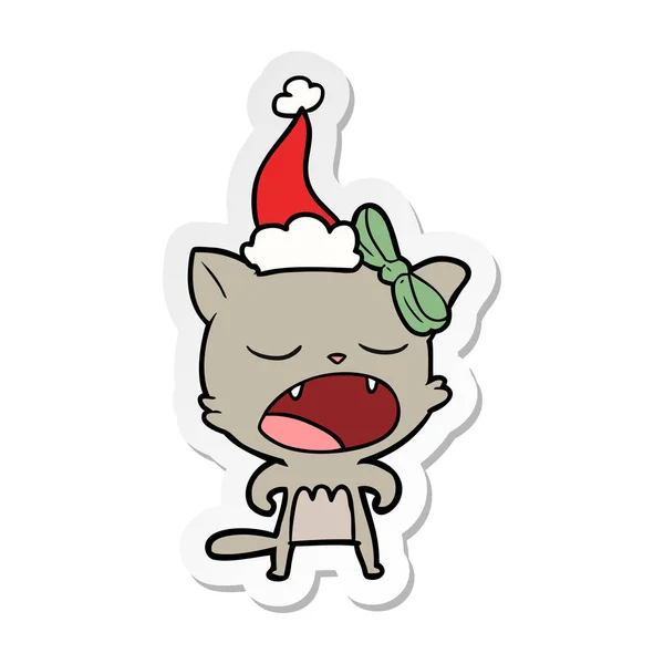 산타 모자를 쓰고 meowing 고양이의 스티커 만화 — 스톡 벡터
