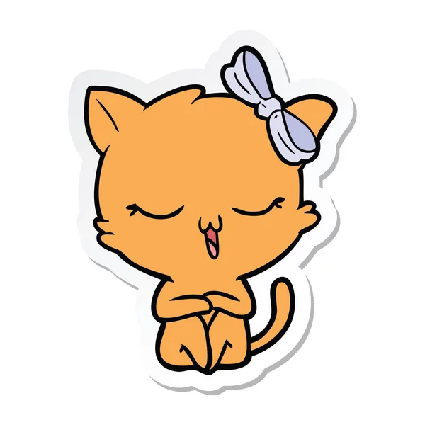 Klistermärke av en tecknad katt med rosett på huvudet — Stock vektor