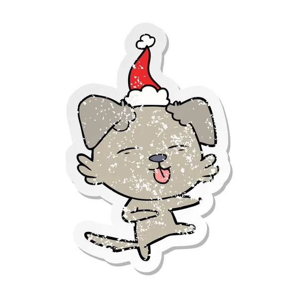 Aufkleber Karikatur eines tanzenden Hundes mit Weihnachtsmütze — Stockvektor