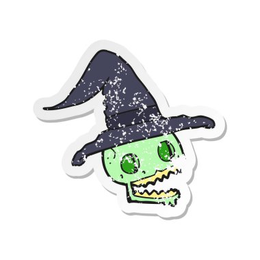 Retro etiket cadı şapka giymiş bir karikatür kafatası sıkıntılı