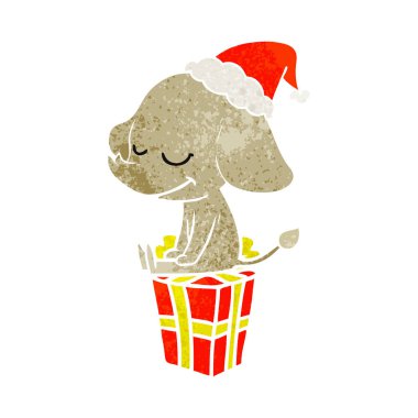 Noel Baba şapkası giyen gülümseyen bir filin retro çizgi film el çekilmiş