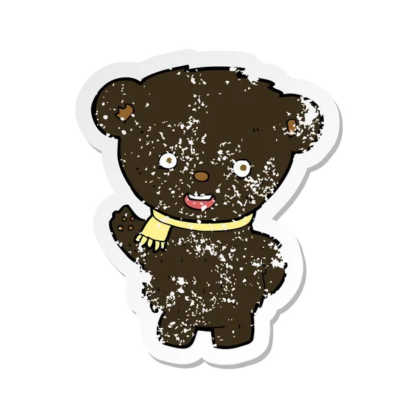 Retro Aufkleber Eines Cartoon Schwarzbären Winkt — Stockvektor