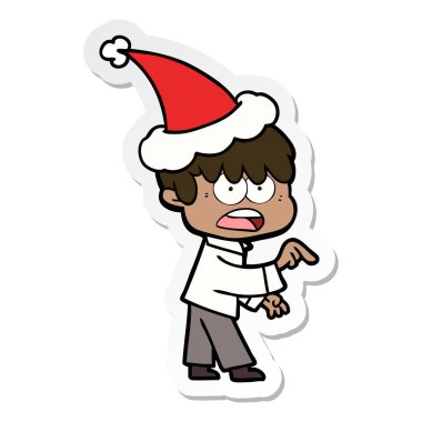 etiket karikatür Noel Baba şapkası giyen bir çocuk endişe el çekilmiş