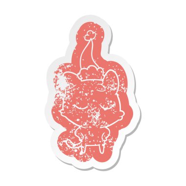 Noel Baba şapkası giyen bir kedi mutlu karikatür sıkıntılı etiket