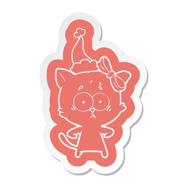 Noel Baba şapkası giyen bir kedi çizgi film etiketi