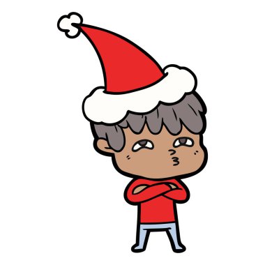 Noel Baba şapkası giyen bir meraklı adam çizgi çizme