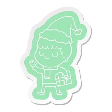 Noel Baba şapkası giyen bir huysuz çocuk çizgi film etiketi