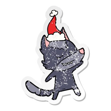 sıkıntılı etiket karikatür Noel Baba şapkası giyen bir kurt dostu el çekilmiş